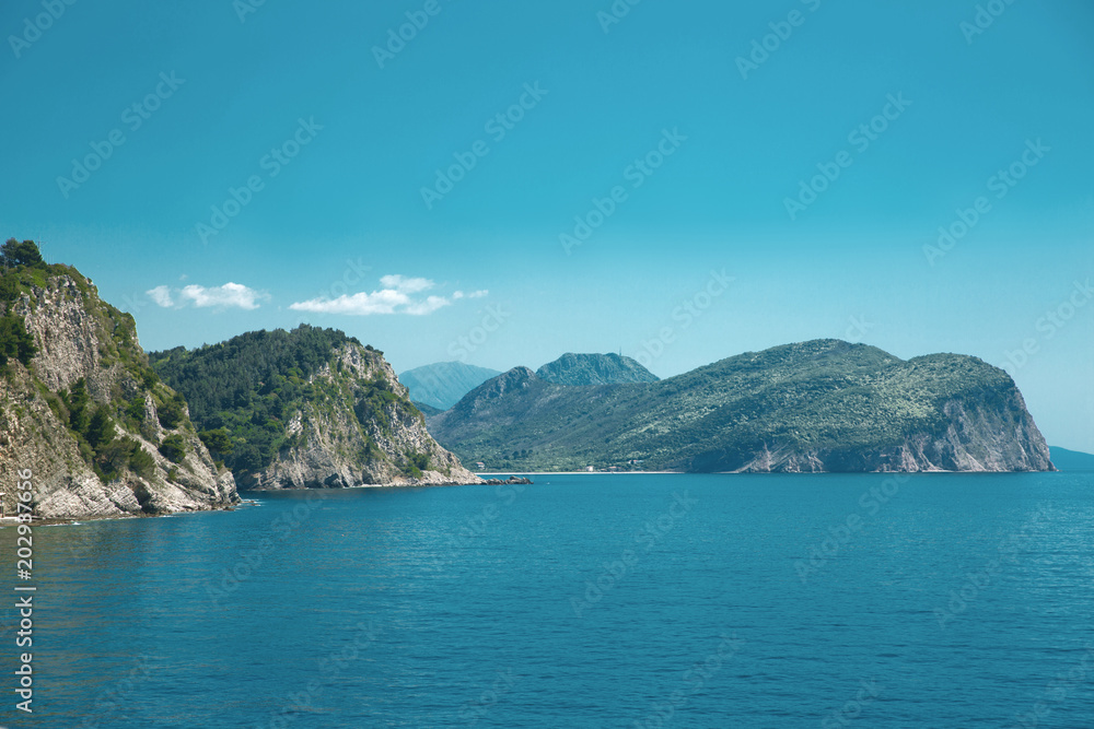 Coast of Montenegro in the Petrovac area. Beautiful mediterranean Ridge mountains landscape.