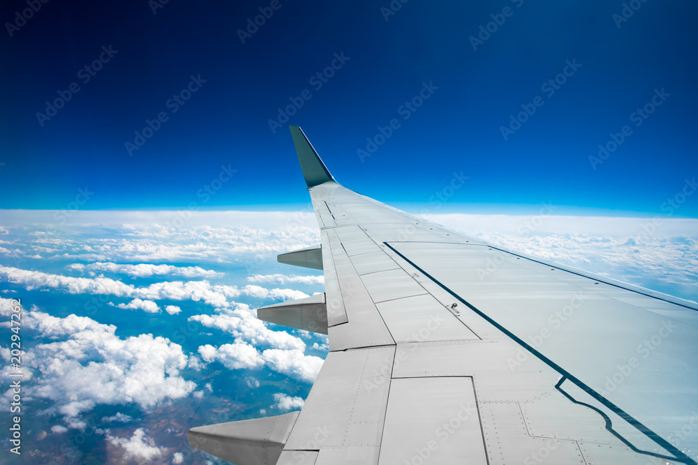 Wing of an airplane.  Traveling concept