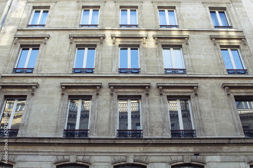 Bottom view of a building in Paris showing French / Parisian architectural style.
