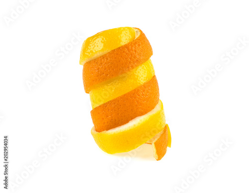 peel of lemon and orange on white background