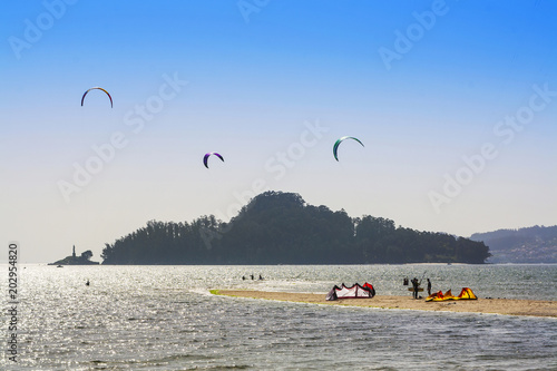 Kitesurfing in front of Tambo island