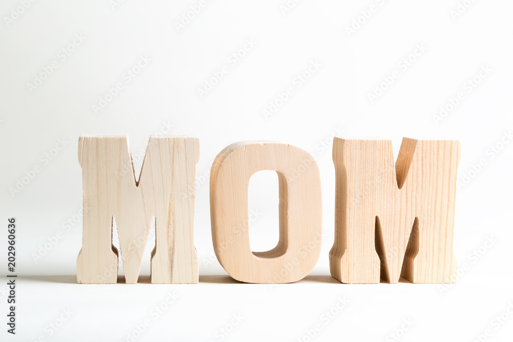 Mom letter blocks Mother's Day theme on a white background Mom letter blocks Mother's Day theme on a white background