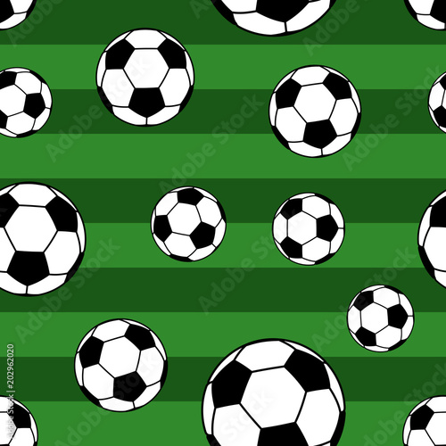 Seamless pattern of big soccer balls on striped background in green colors