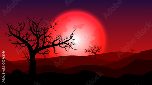 Photos silhouette rainless landscape;blood moon on desert at twilight;desert in summer
