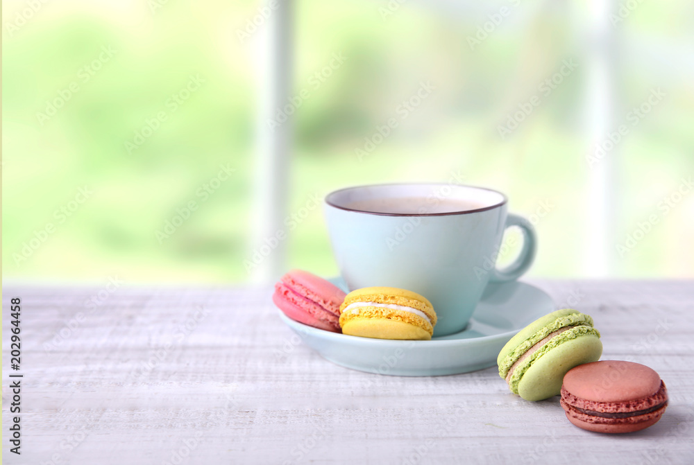 Coffee and macaroons on wooden empty space background. Coffee and macaroons on wooden empty space background.