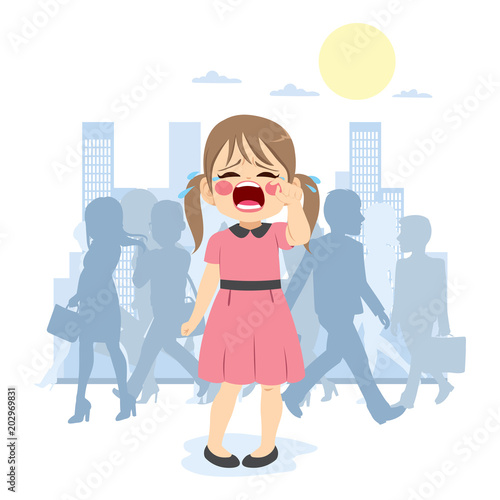 Little young cute girl crying lost in crowded city