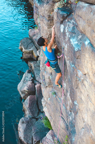 A climber above the water.