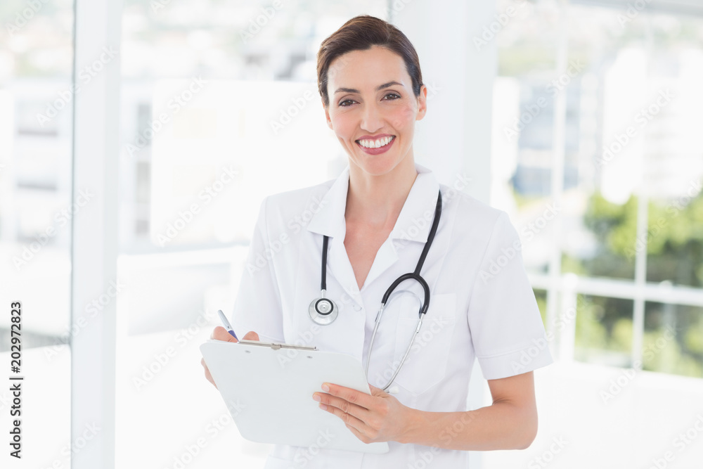 Beautiful doctor reading files Beautiful doctor reading files
