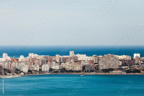 Fototapeta Naklejka Na Ścianę i Meble -  Landscape view from the top of the Castle of Santa Barbara in the background the beaches of the beautiful city of Alicante, Spain