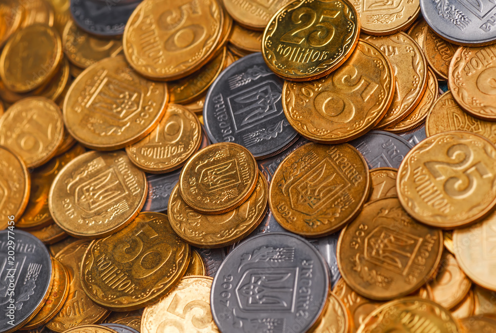 A large pile of coins from a Ukrainian bank. Ukrainian type coins: Kopeck. Concept for banking affairs, taxes, debt, A large pile of coins from a Ukrainian bank. Ukrainian type coins: Kopeck. Concept for banking affairs, taxes, debt,