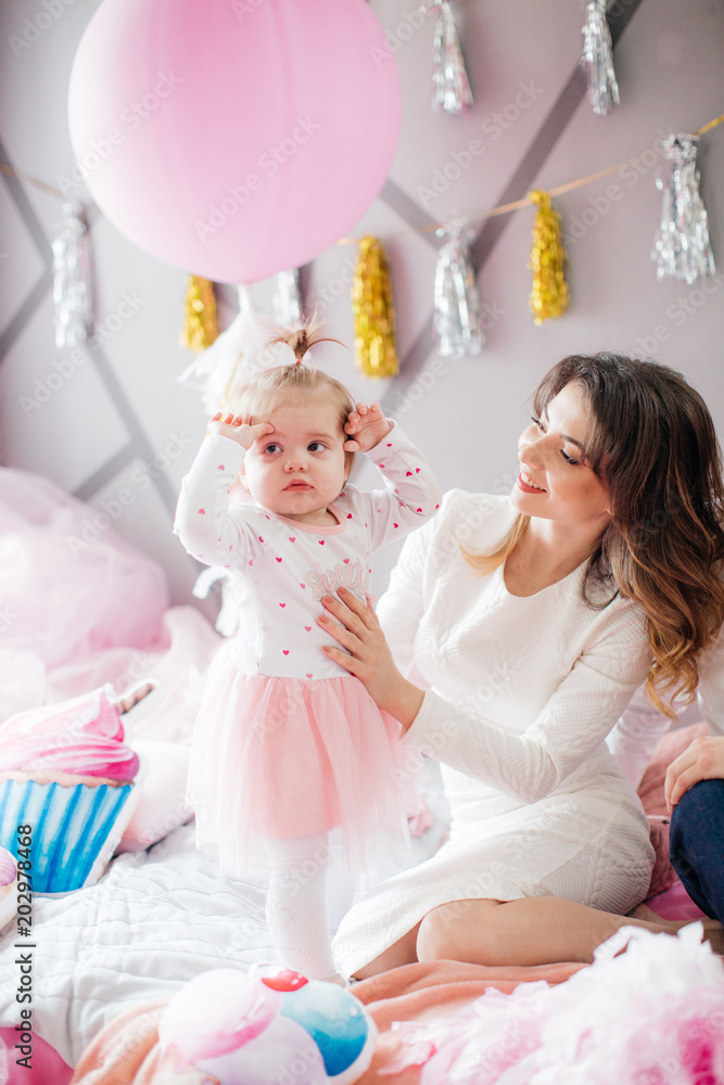 Happy family celebrating birthday of little girl Happy family celebrating birthday of little girl