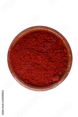 paprika in a bowl isolated 