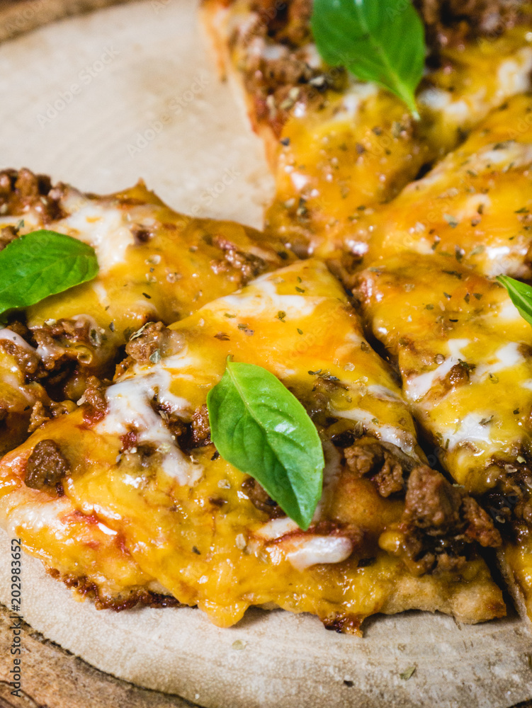 fresh baked crisp pizza with meat cheese and fresh Basil leaf fresh baked crisp pizza with meat cheese and fresh Basil leaf