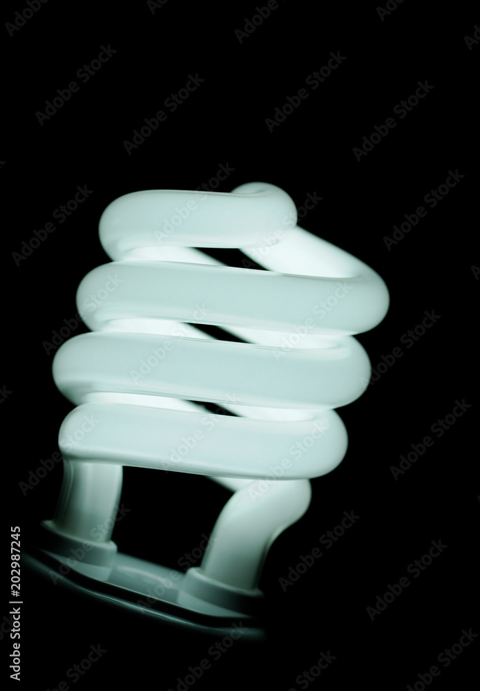Energy saving compact flourecent lightbulb, close up Energy saving compact flourecent lightbulb, close up