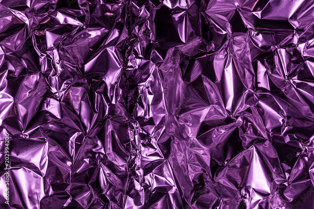 Full frame take of a sheeT of crumpled silver aluminum foil Full frame take of a sheeT of crumpled silver aluminum foil