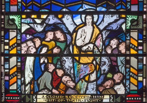 LONDON  GREAT BRITAIN - SEPTEMBER 16  2017  The scene of Ascension of the Lord on the stained glass in church St Etheldreda by Charles Blakeman  1953 - 1953 .