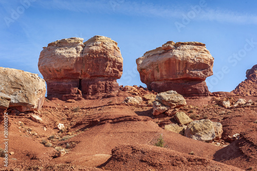 Twin Rocks,Capitol Reef National Park. Located in south-central Utah in the heart of red rock country, this is a hidden treasure filled with cliffs, canyons, domes and bridges in the Waterpocket Fold