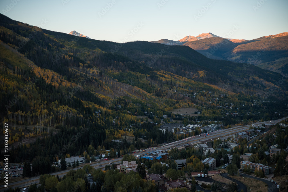 Landscape view of Vail Valley, Colorado during sunrise in autumn.. 