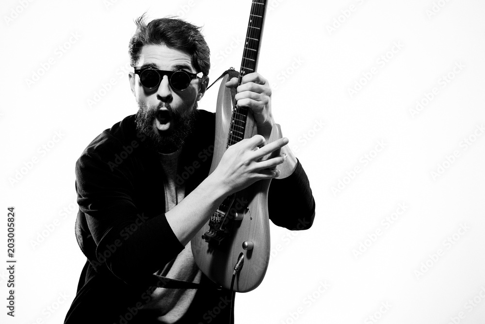 Obraz premium young man with a guitar