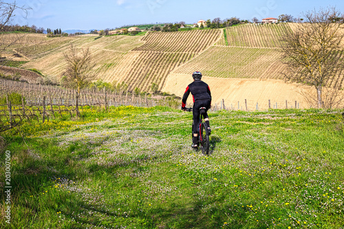 Mountain biker on rural field © Vivida Photo PC