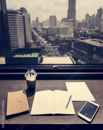 Photography Working by the window on a wooden table