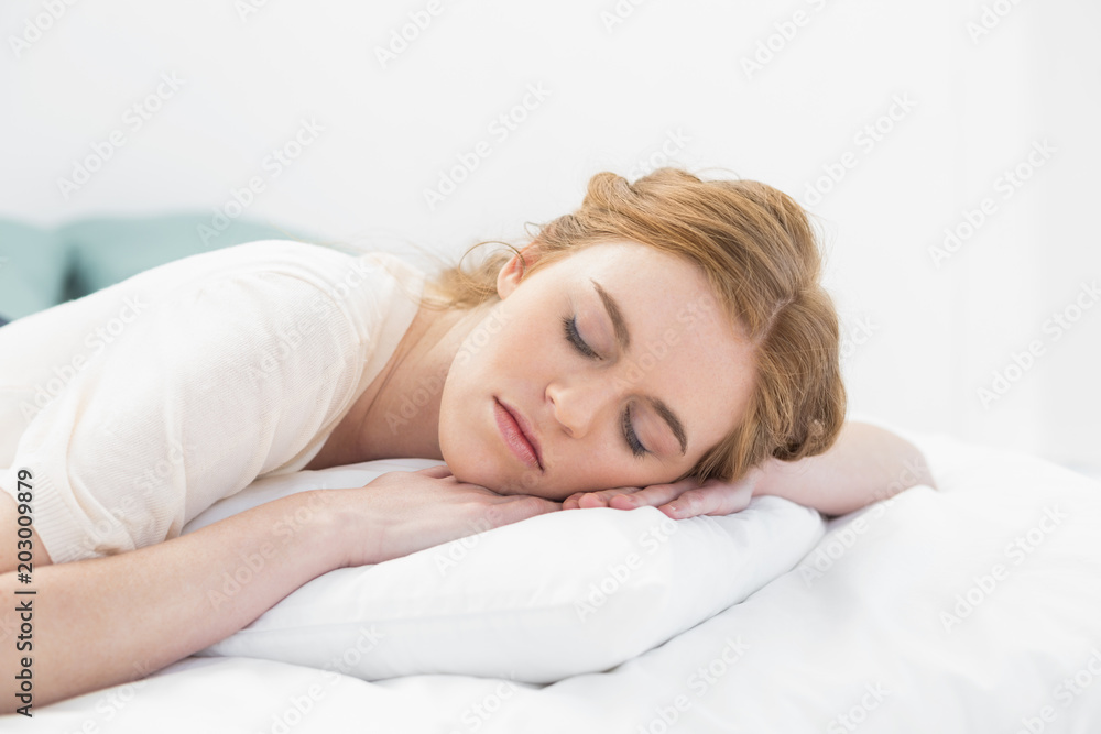 Close up of pretty young woman sleeping in bed Close up of pretty young woman sleeping in bed