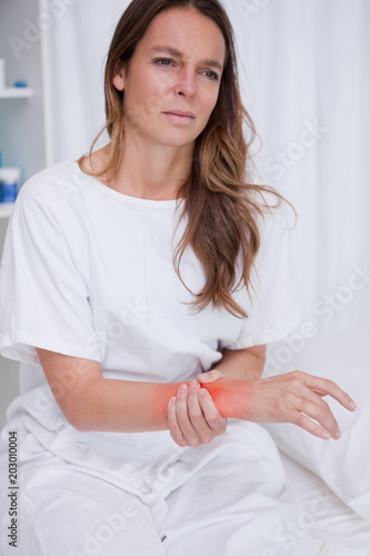 Woman in the hospital suffering from pain