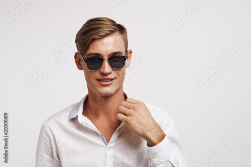 portrait of young man in glasses