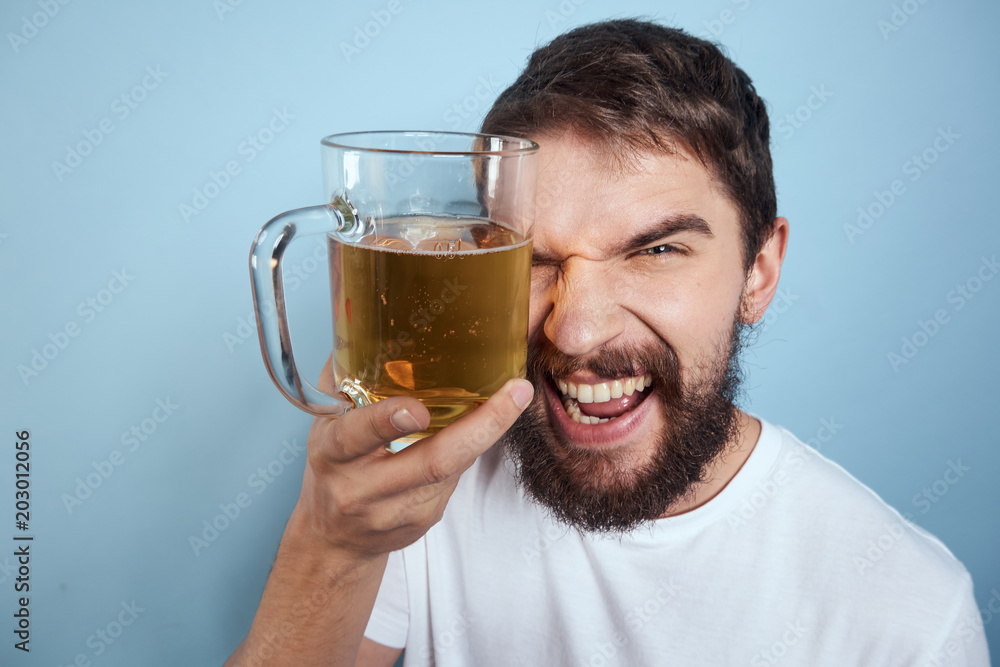 man with glass of beer isolated on white man with glass of beer isolated on white