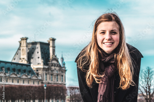 Girl at Louvre Museum in Paris, France photo