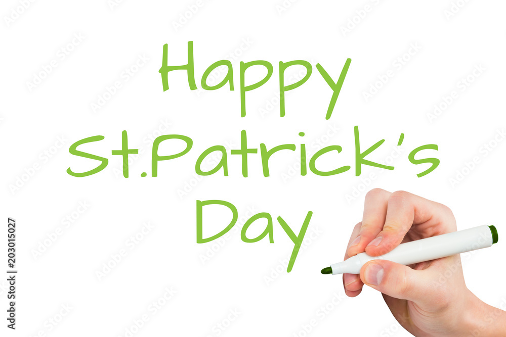 Hand writing with a marker against happy st patricks day Hand writing with a marker against happy st patricks day