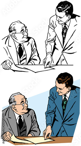 Two businessmen discussing some papers during a meeting.