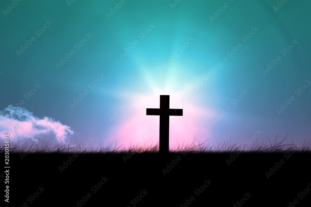 Wooden cross against magical sky
