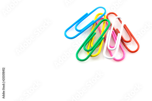 Colorful paperclips isolated on white background
