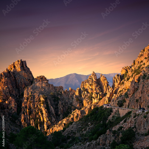 Sunset at the road along the famous Calanques de Piana in Corsica, France