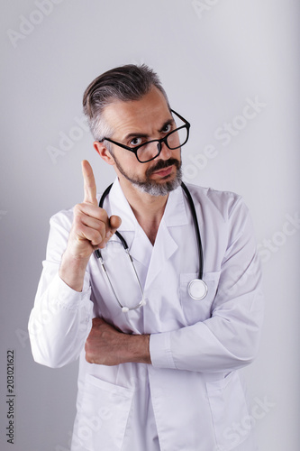 Portrait of middle age doctor