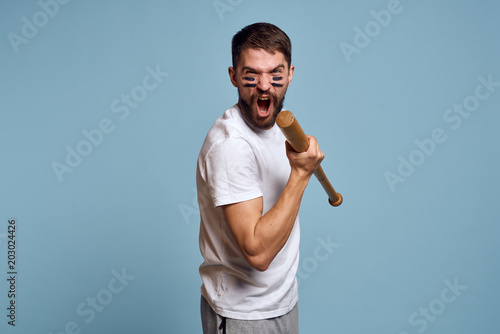 angry man shouting tennis bat