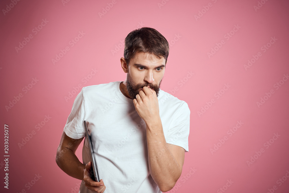 man thinks on a pink background man thinks on a pink background