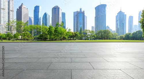 panoramic skyline and buildings with empty square floor in shanghai
