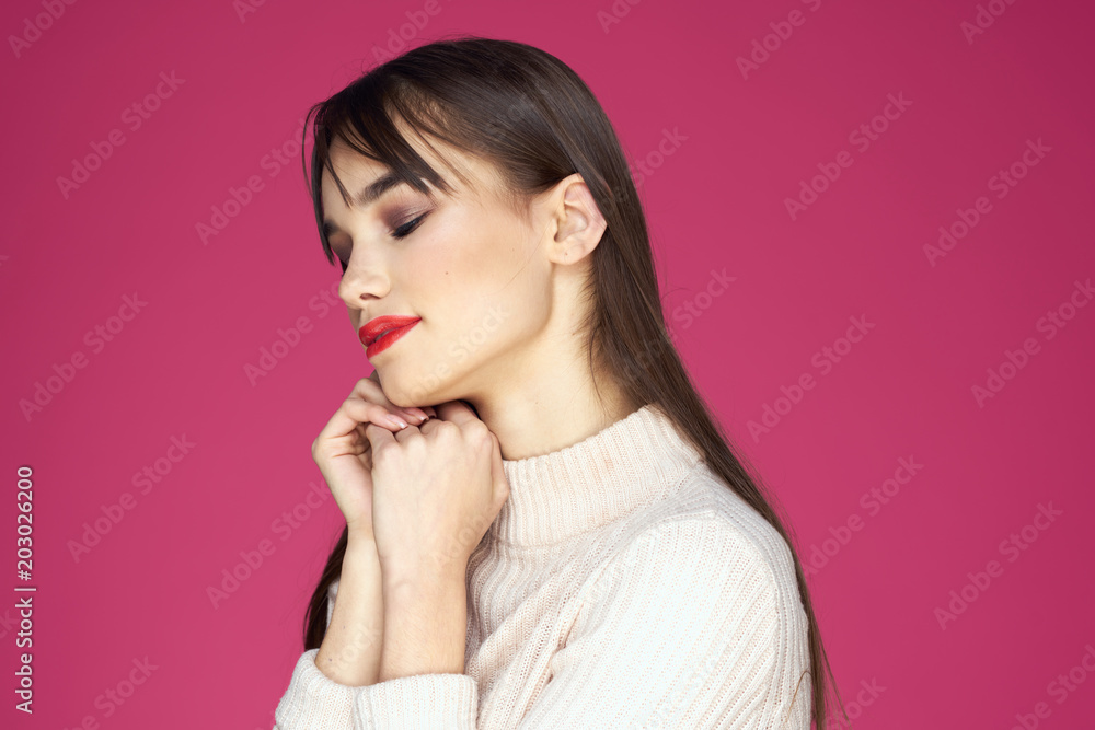 woman with make up on pink background
