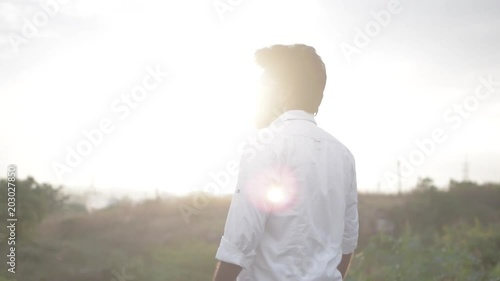 Silhouette of a man during Golden hour - Ungraded FLAT footage photo