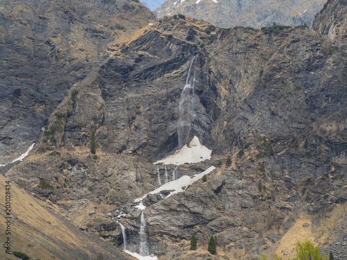 Valbondione, Bergamo, Italy. Drone aerial view of the Serio waterfalls during spring time with the minimum flow of water. The tallest waterfall in Italy photo