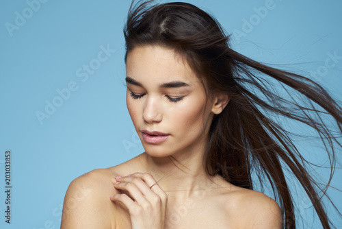 beautiful woman with her hair and eyes closed
