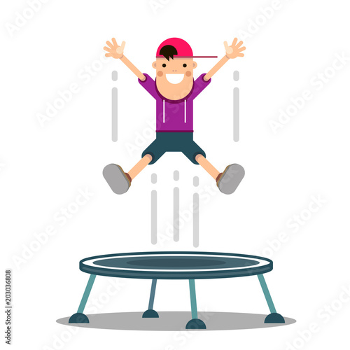 the boy jumps on a trampoline