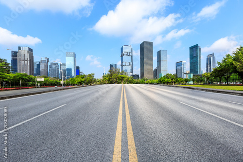 empty asphalt road and modern commercial office buildings in shenzhen © ABCDstock