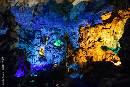 Colorful inside of Hang Sung Sot cave world heritage site in Halong Bay, Vietnam