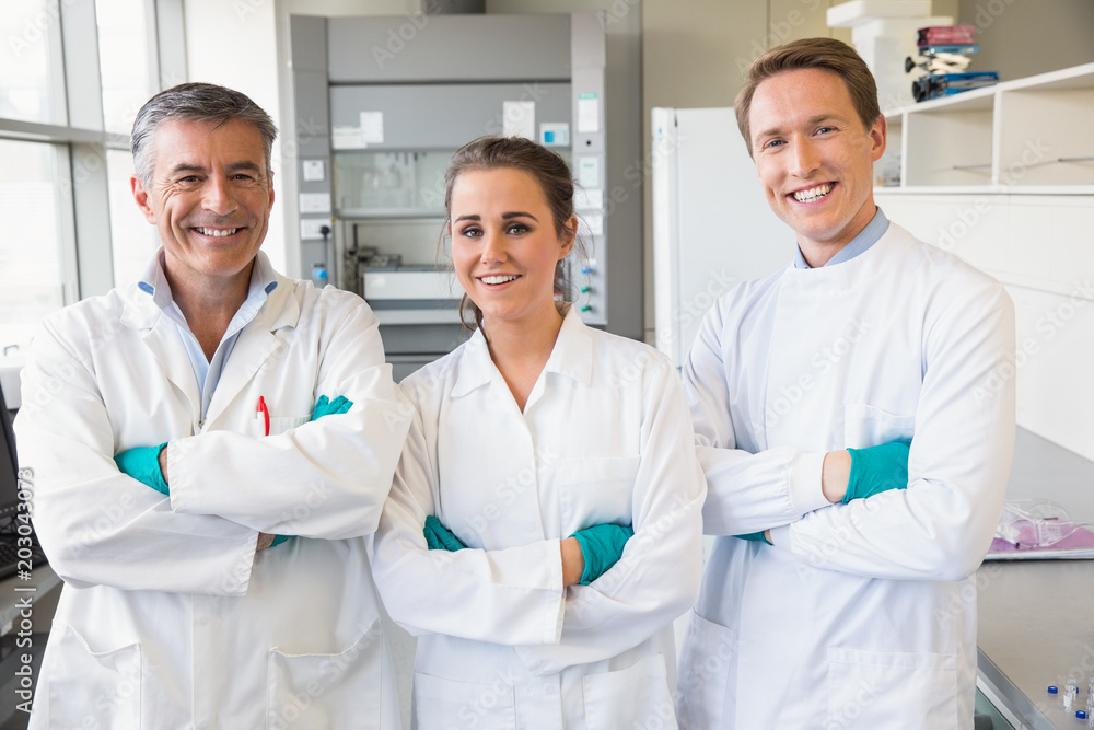 Team of scientists working together Team of scientists working together