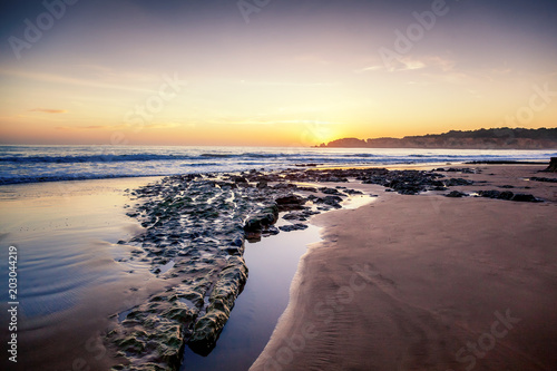 Atlantic coast at sunset, Algarve, Portugal. Stunning beautiful landscape © olezzo