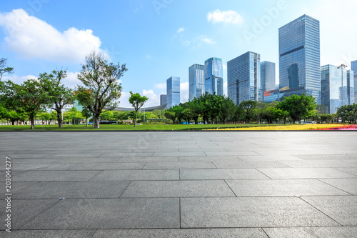 empty square floor and modern commercial office buildings