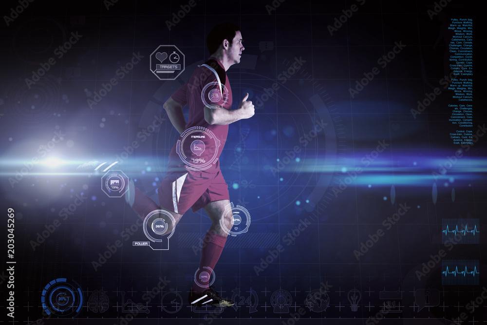 Obraz premium Football player in red running against blue dots on black background